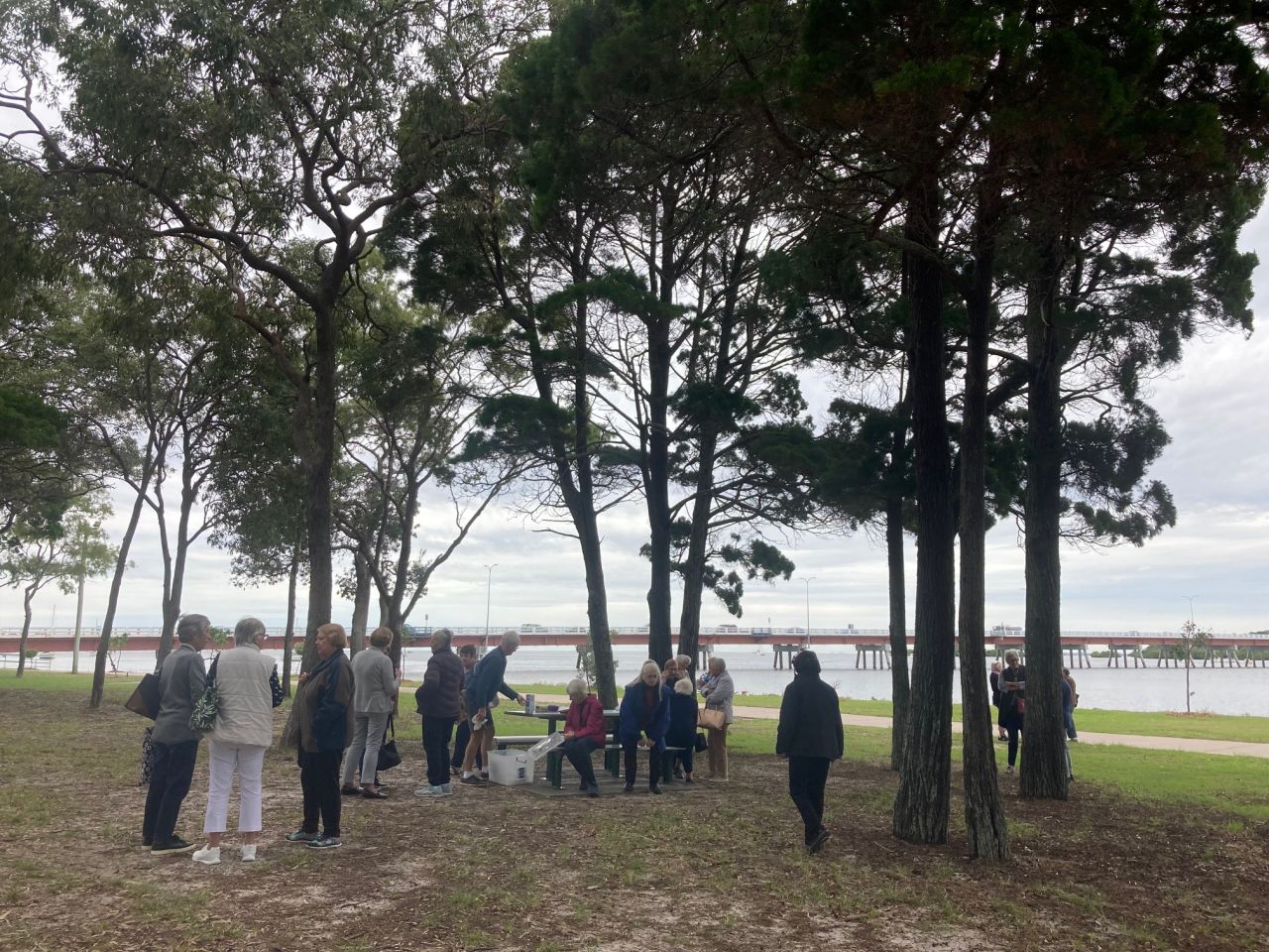 Members and guests enjoying morning tea at Bribie Island during the May 2022 day bus trip