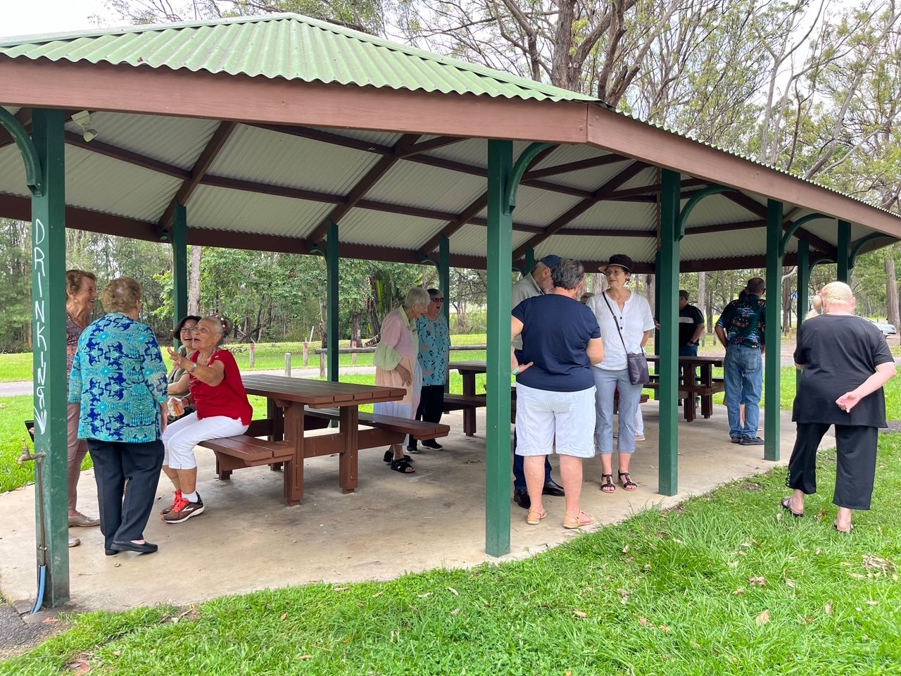 Members and guests enjoyed morning tea during a day bus trip to Buderim for Christmas in December 2023