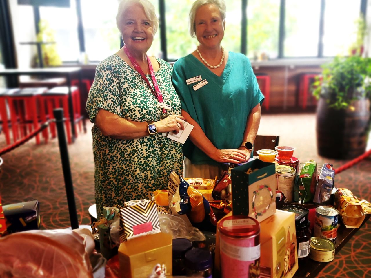 Christmas Lunch at The Brunswick 2024. 
Diane & Anne acknowledging all the Christmas treats brought in by our members for the Brunswick Pantry. Thank you everyone!