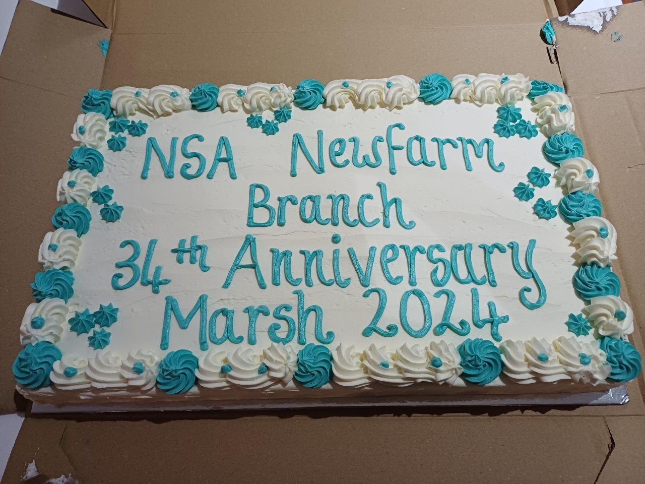 NSA NFB: 
Celebrating our 34th Anniversary, March (?) 2024. Our thanks to Grace Grace for donating the cake from Bakeology.