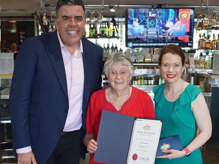 Pat Healey being presented with a certificate for her 95th birthday by the local federal member and speaker - Milton Dick