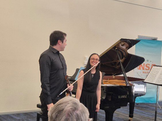 Shannon Rhodes on the Violin and Gladys Chia on the Piano before the start of the Concert
Photo Courtesy Peter Macri