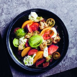 Tomato salad with stracciatella and sourdough